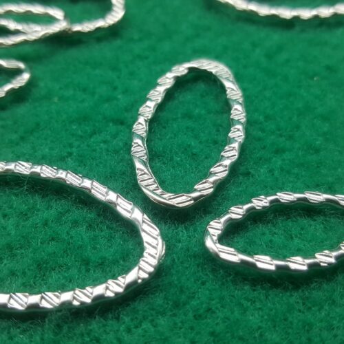 anello ovale diagonale