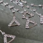 spallina strass triangolo metallo