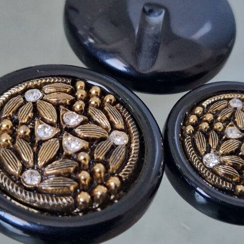 bottoni acrilici neri e oro con strass