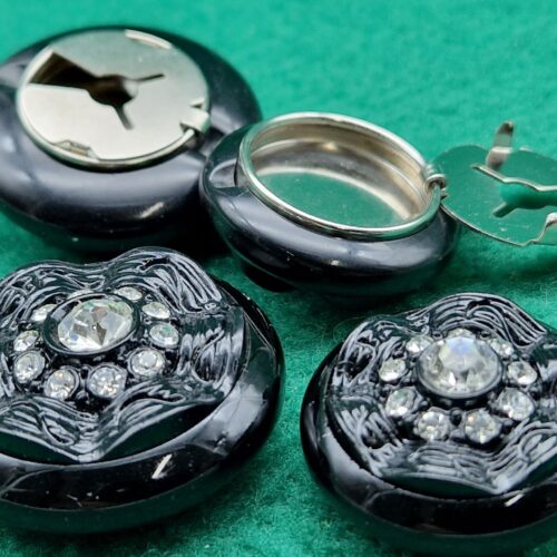 copribottoni neri con strass