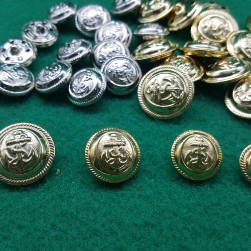 bottone metallo ancora con bordo