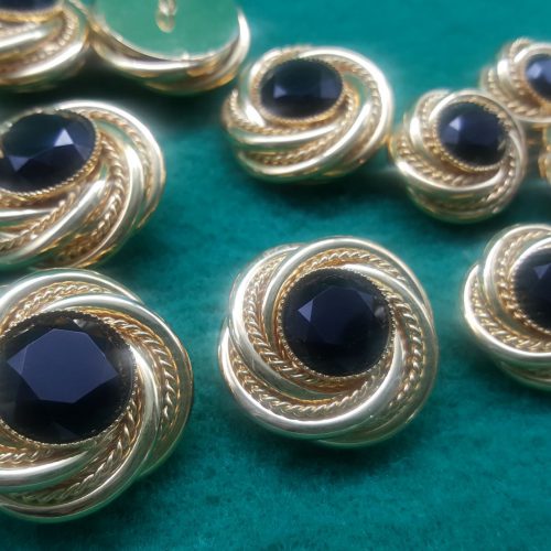 Bottoni dorati intreccio nero