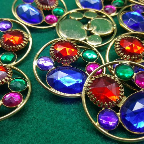 bottoni metallo con pietre colorate