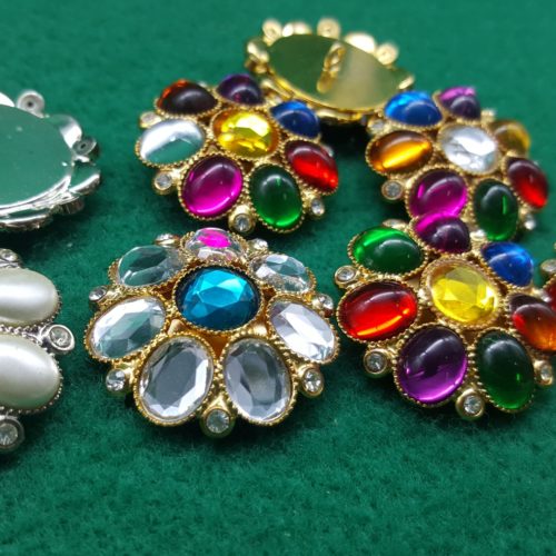 bottoni in metallo a sette petali