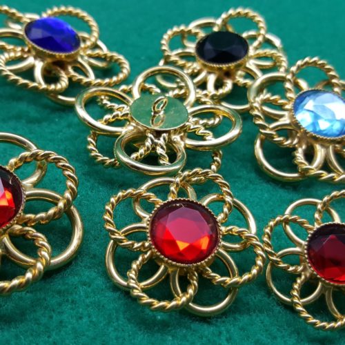 bottoni dorati fiore colorato