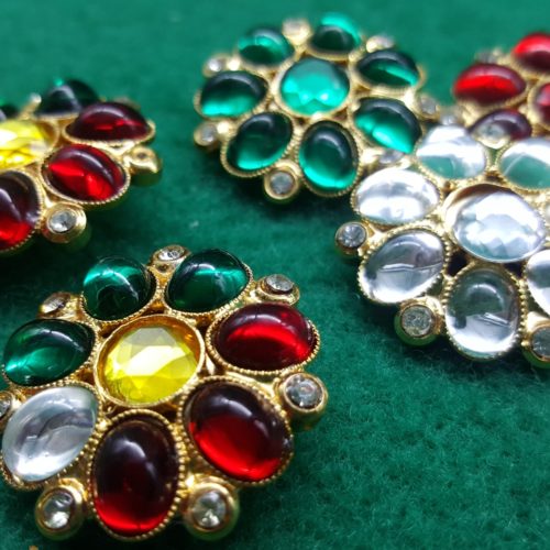 Bottoni in metallo dorato sette petali