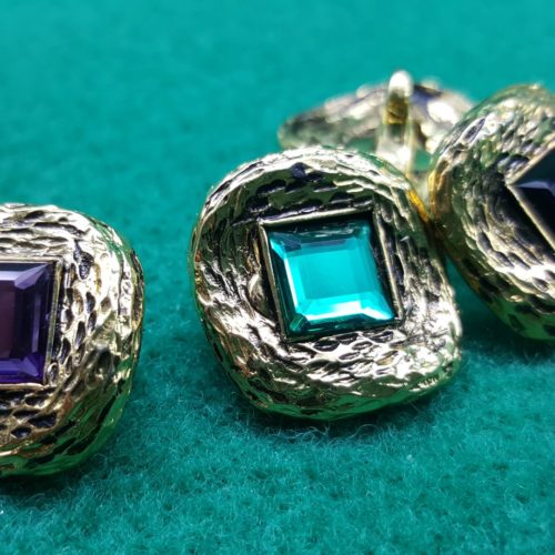 bottoni in metallo ondulati