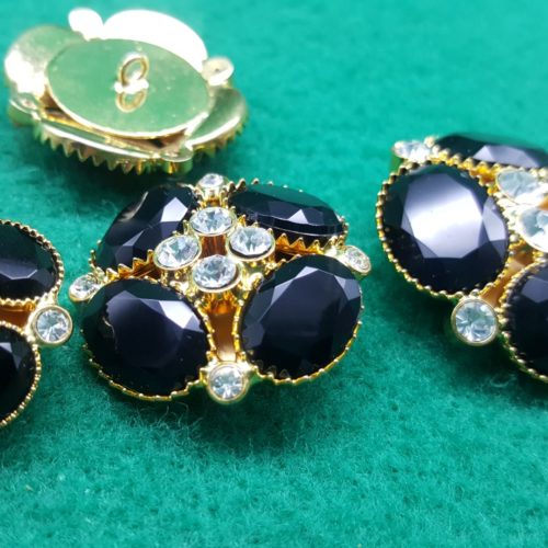 BOTTONI DORATI pietre nere