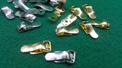 CHIUSURA A SCATTO PER ABBIGLIAMENTO