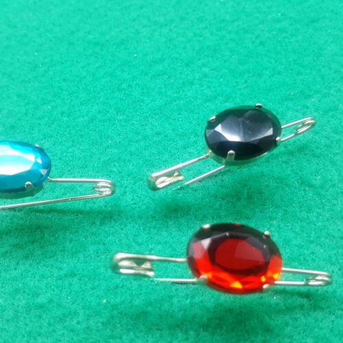 spille di sicurezza con pietra ovale