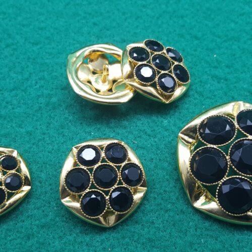 BOTTONI DORATI PIETRE NERE