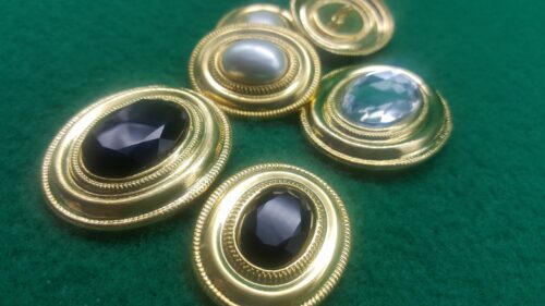 BOTTONE DORATO OVALE DECORATO - Produzione e vendita articoli per