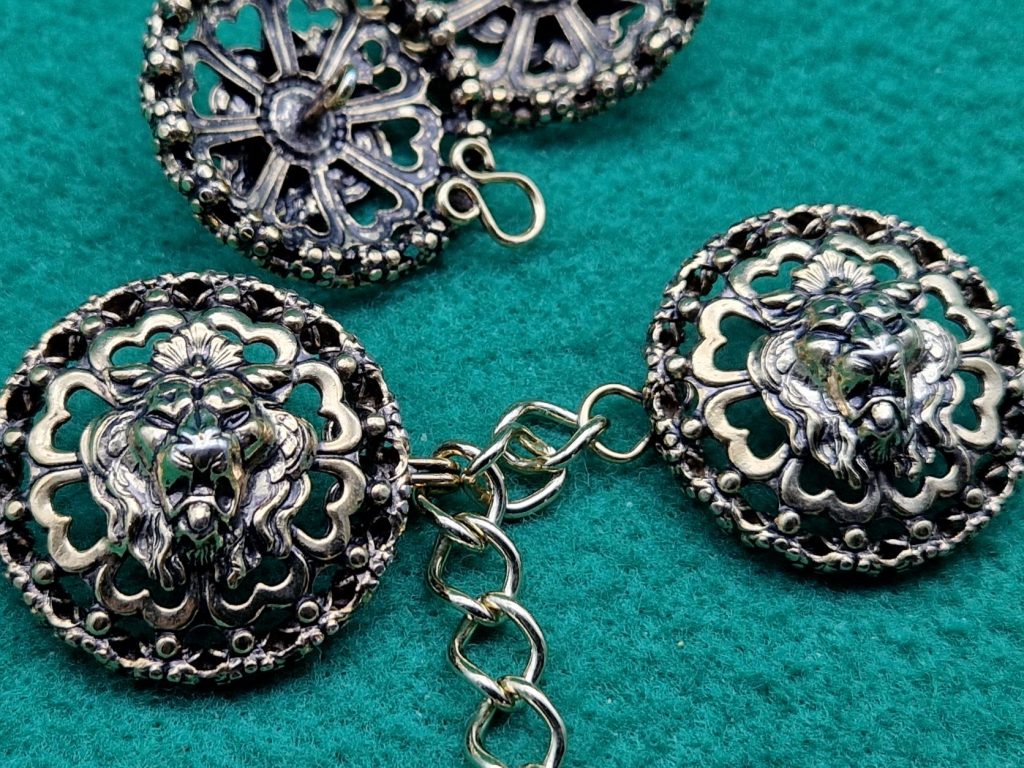 ALAMARO metallo TRAFORATO LEONE