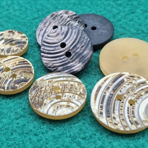 bottoni effetto corno